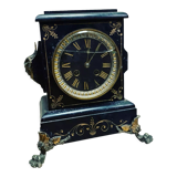 Black marble clock and brass ornament