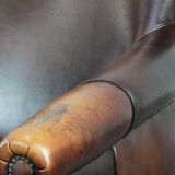 Characterful and comfortable cowhide leather armchair