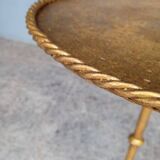 Minimalist brutalist gold metal pedestal table