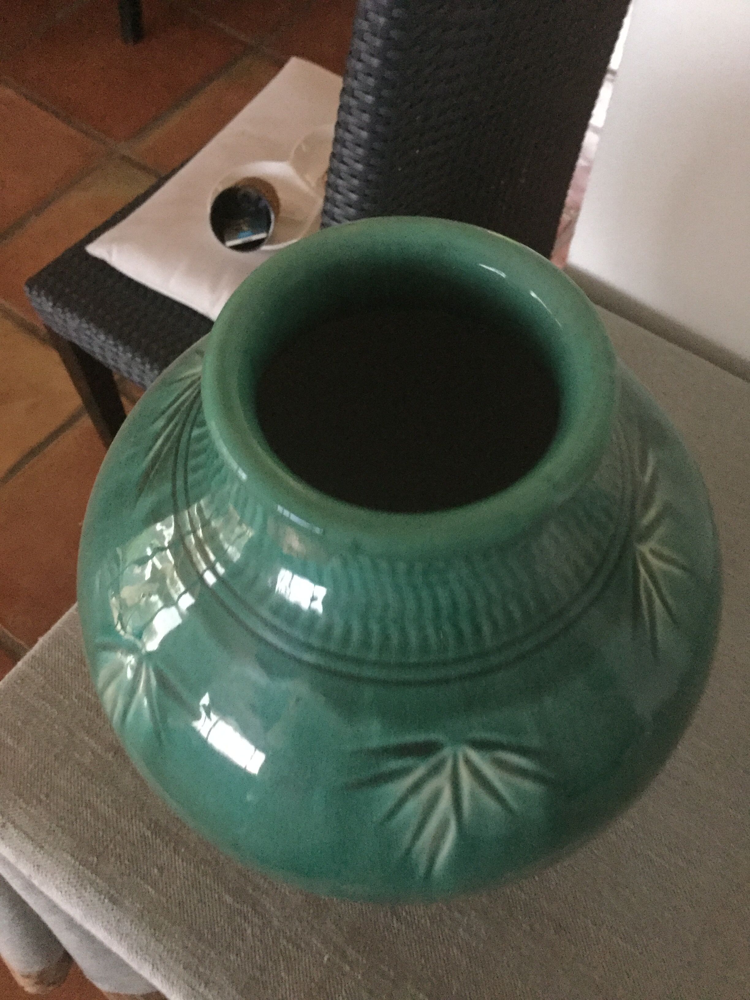 Green earthenware vase base with black flame decoration