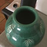 Green earthenware vase base with black flame decoration