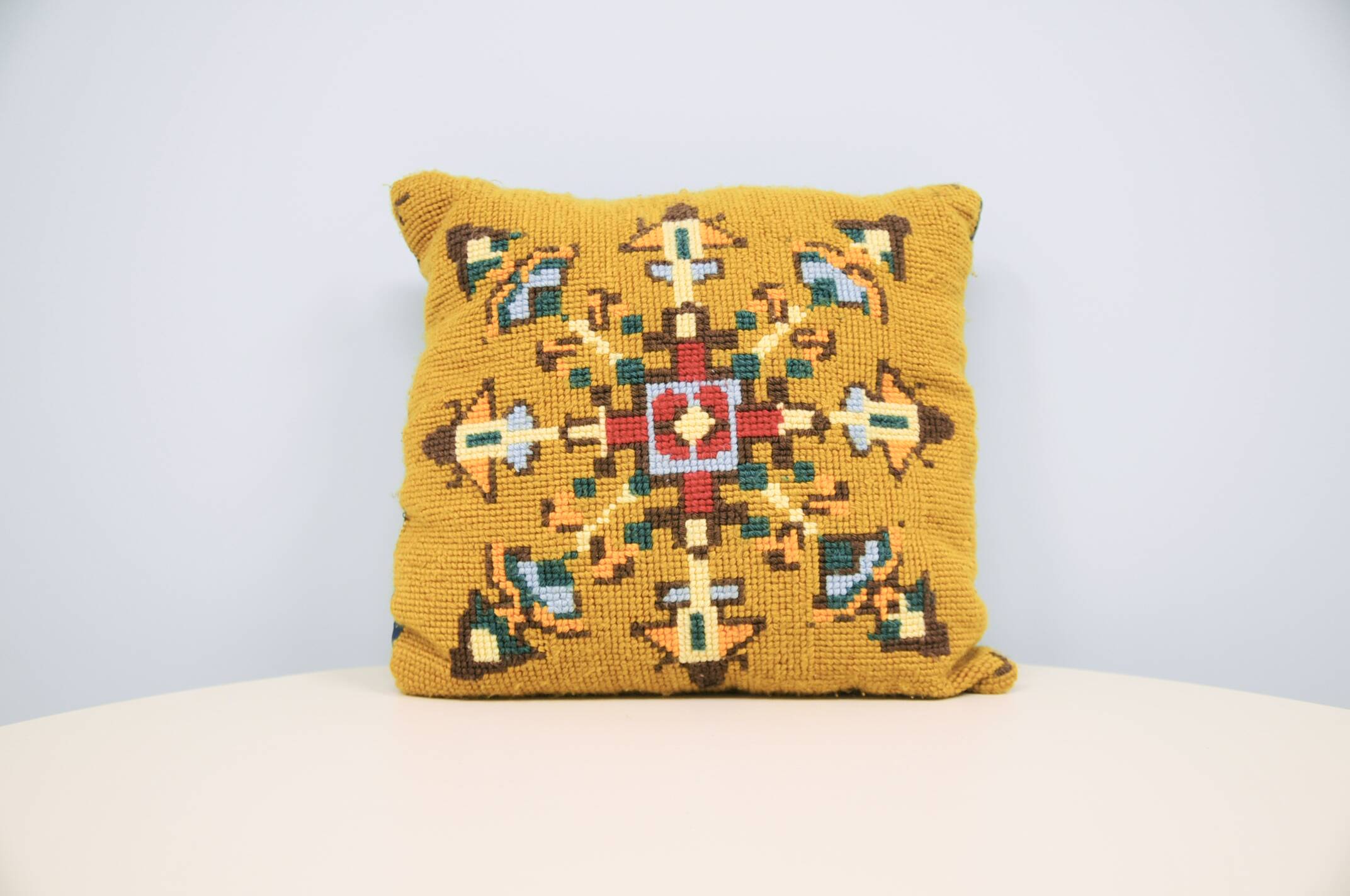 vintage ochre embroidered cushion