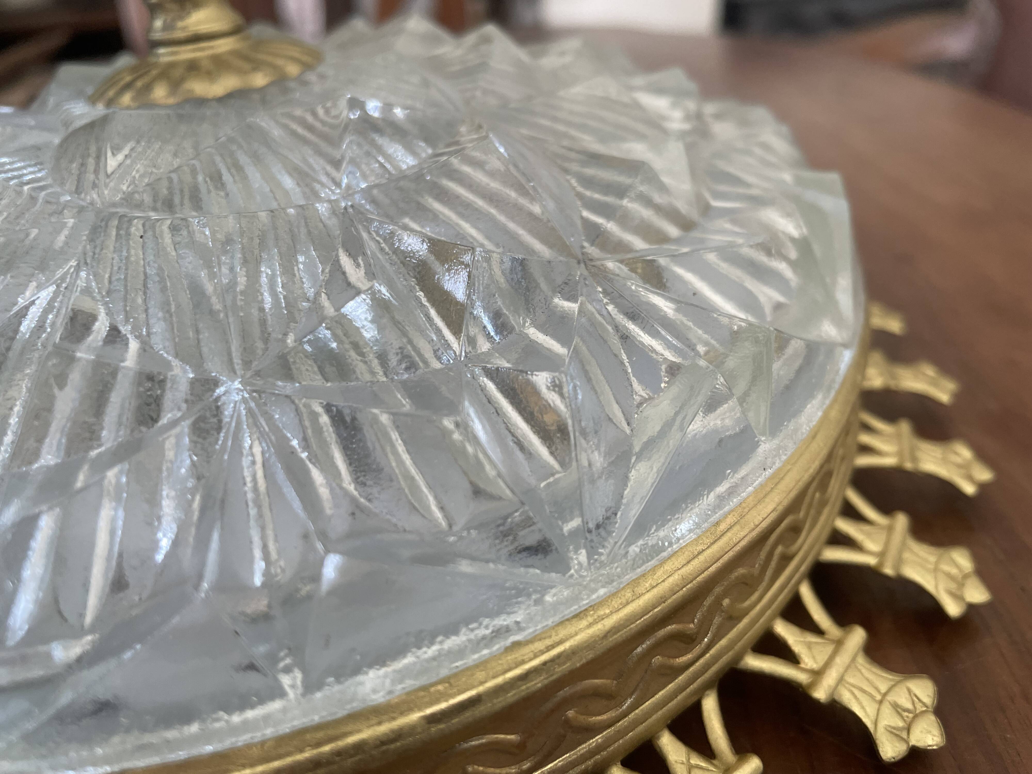 Vintage ceiling light with cut glass and gold metal.