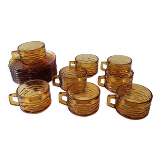 Set of 8 cups and amber glass under cups