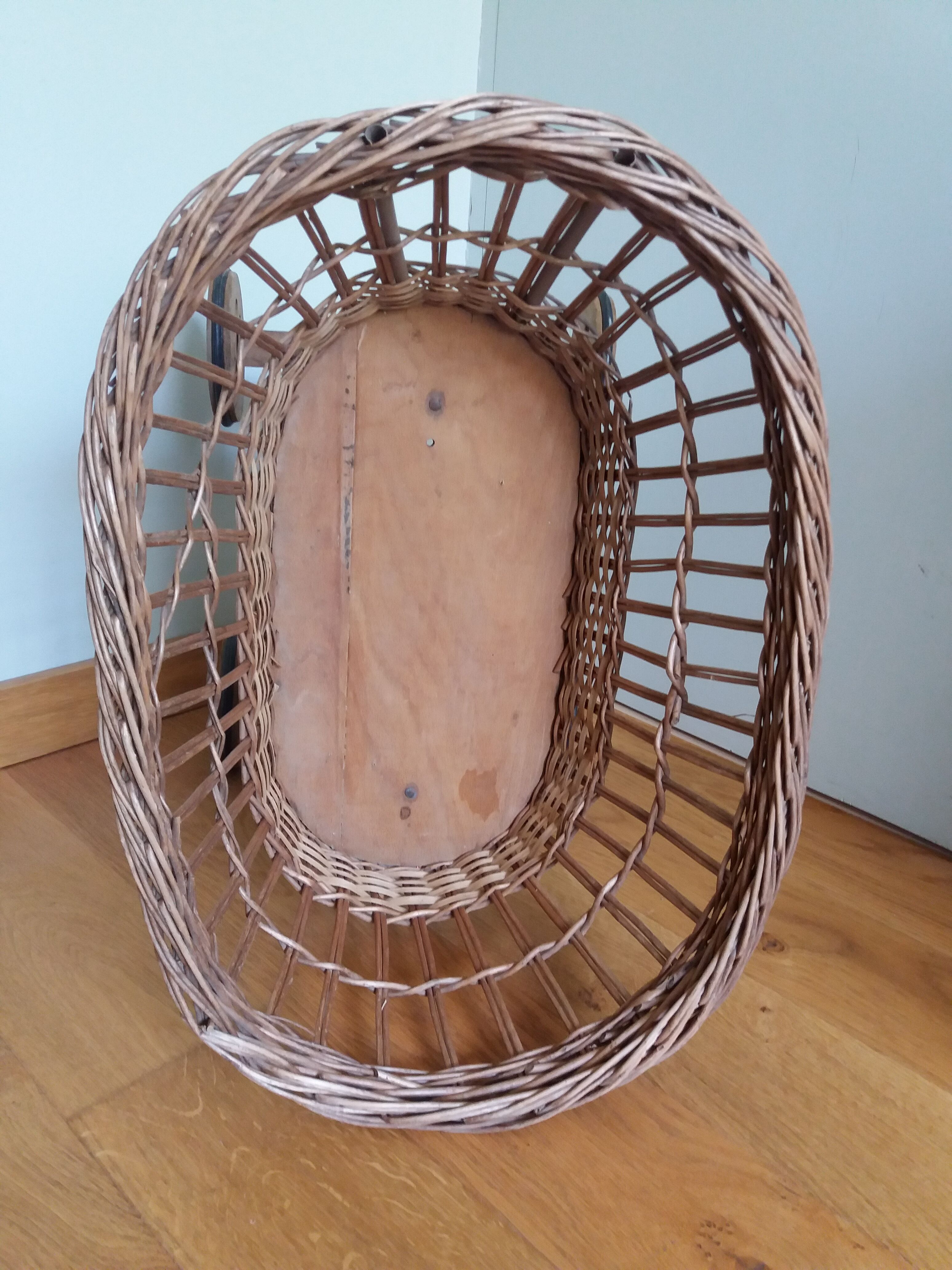 Wicker rattan doll cradle with wheels