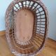 Wicker rattan doll cradle with wheels