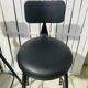 Pair of black bar stools in industrial and contemporary style.