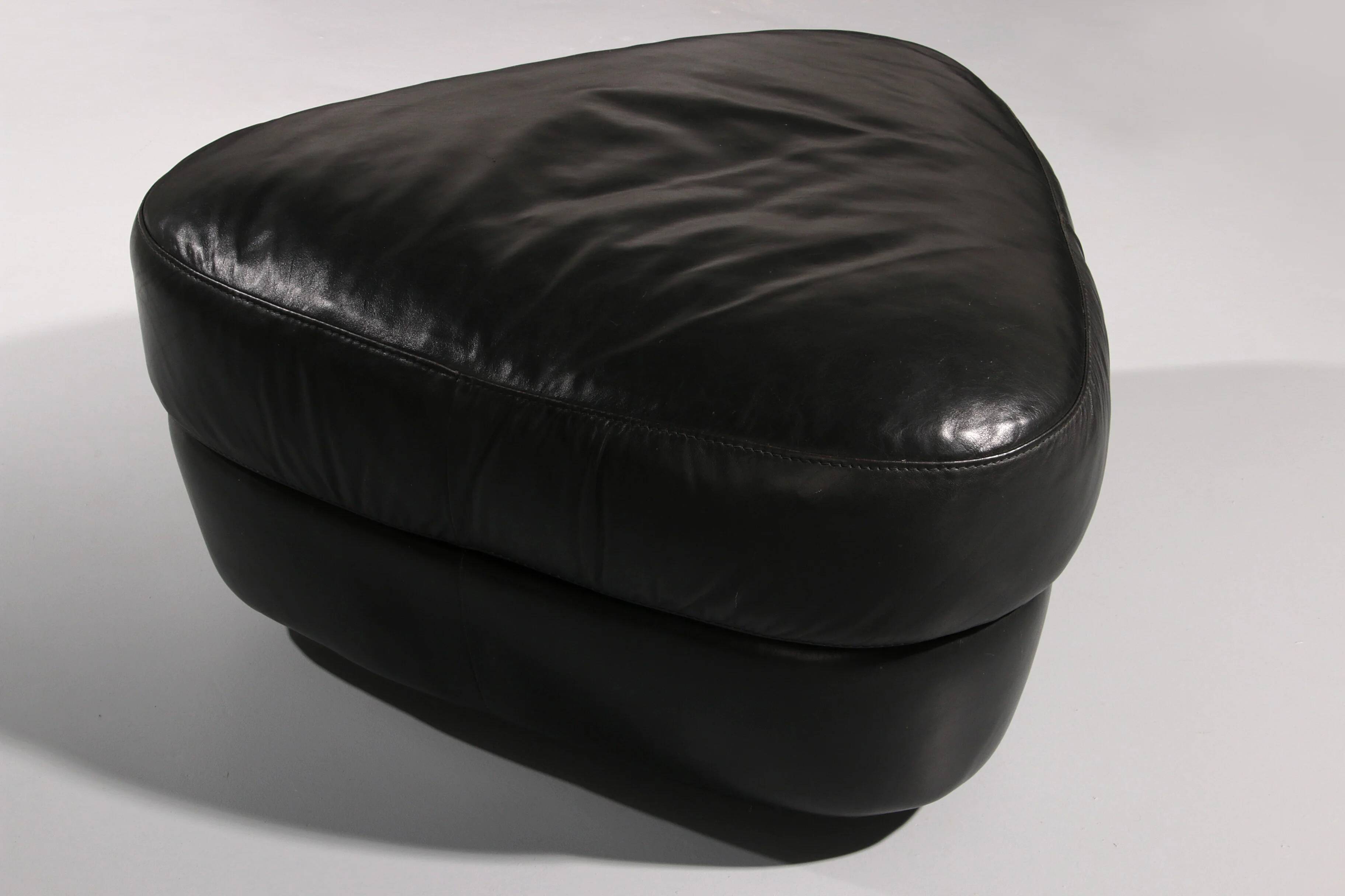 Organically shaped post-modern sectional sofa in black leather