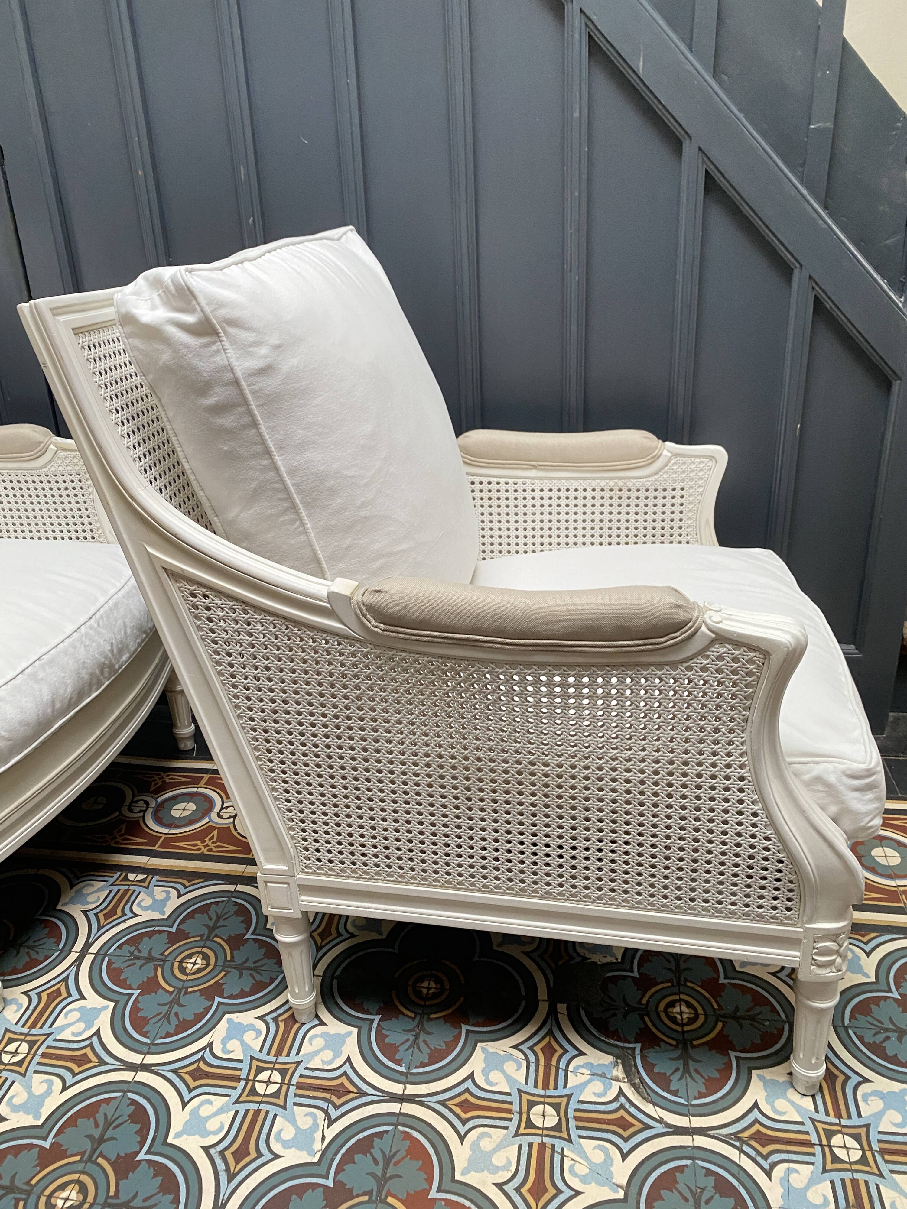 Pair of Louis XVI style caned Bergère armchairs