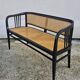 Vienna Secession beech canapé with cane seat and backrest.