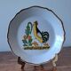 Decorative plate in the 18th-century style. Decoration of a stylised rooster.