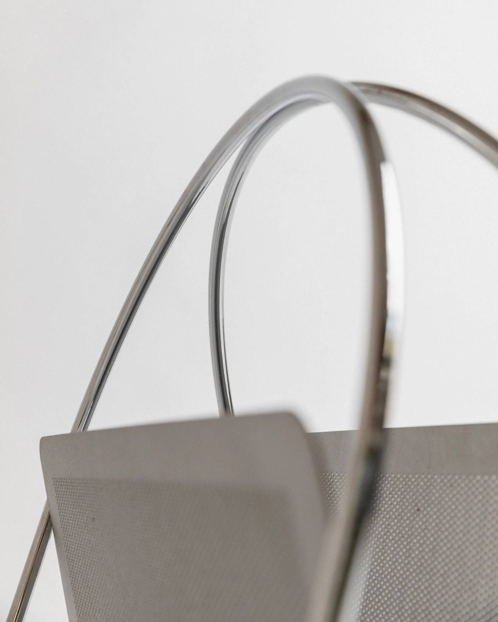 Vintage argent chrome-plated metal magazine rack by Mascagni – perforated, space-age design, Italy 1970s
