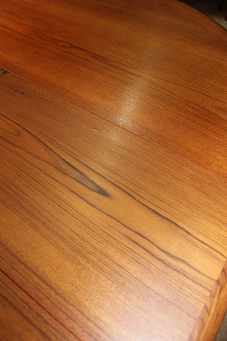 Scandinavian vintage teak dining table with 2 extension cords hidden by Svend Aage Madsen for Knudsen - Son, Denmark