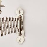 Metal accordion wall candle holder