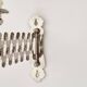 Metal accordion wall candle holder