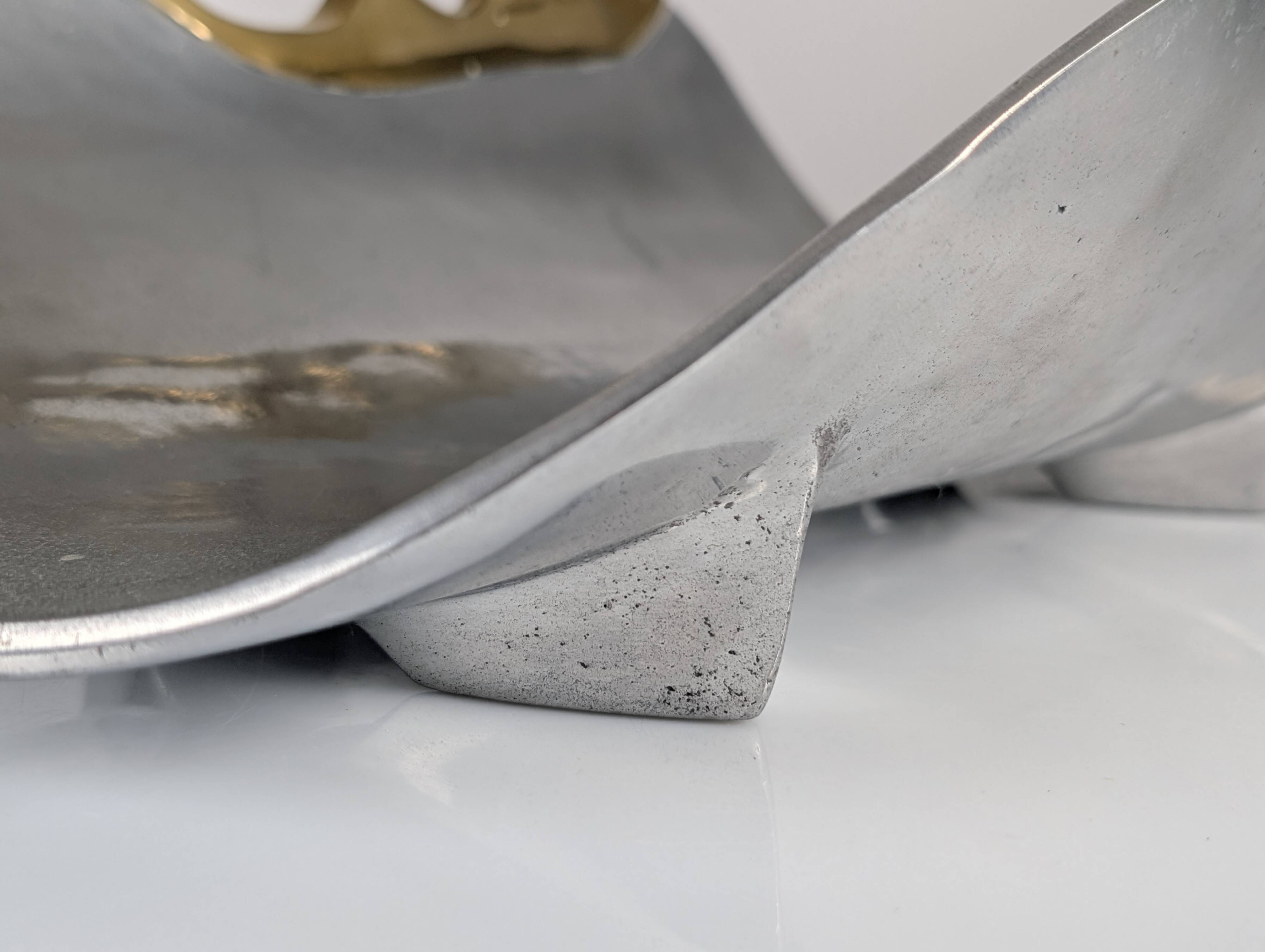 Aluminium and brass log holder by David Marshall, Spain, 1980s