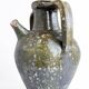 Ancient oil jar in glazed terracotta, khaki green — Auvergne, Lezou