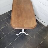 Bistro table with cast iron base and oak top