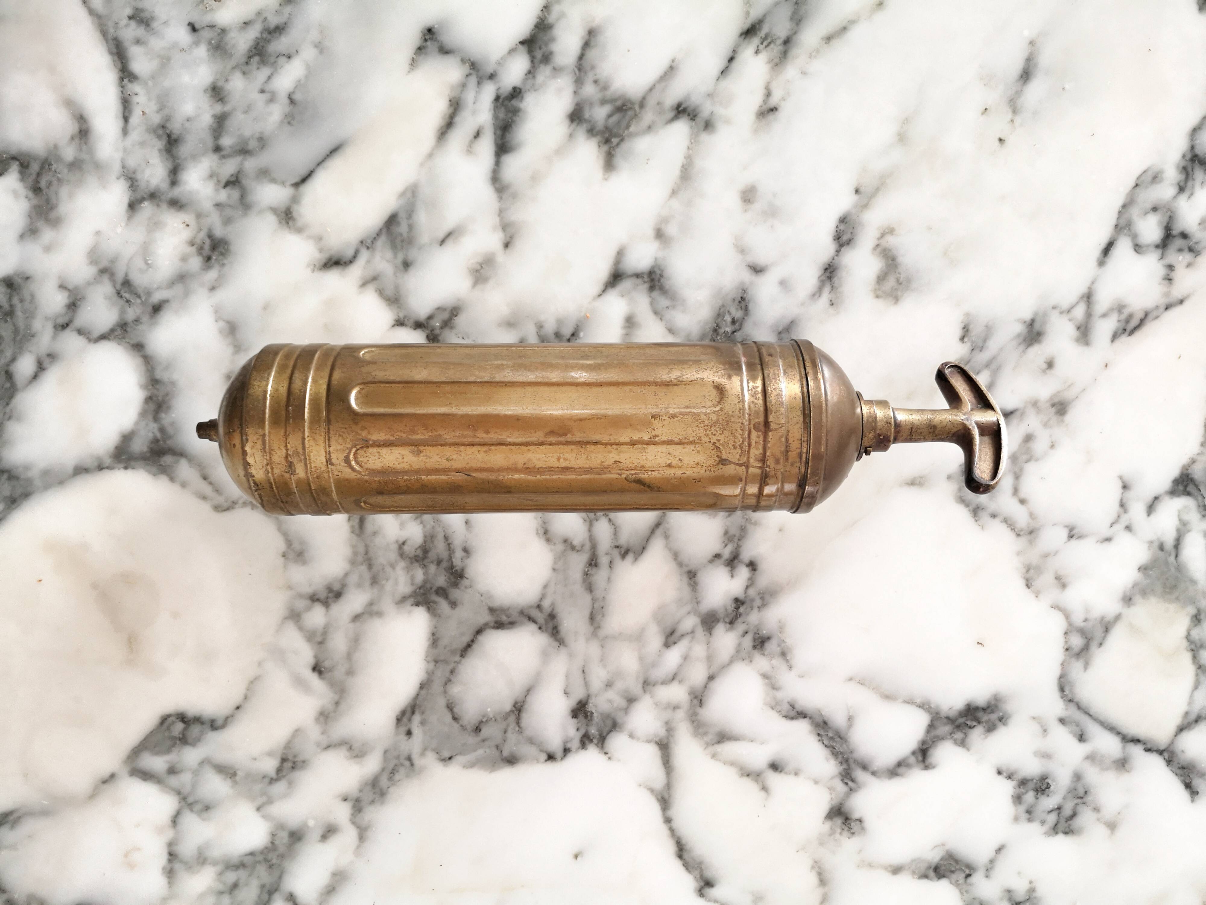 Pyrene, brass fire extinguisher for automobile