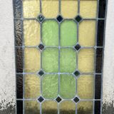 Pair of stained glass windows with geometric patterns late nineteenth century