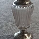 Crystal and solid silver shaker, neck brace and master's mark.