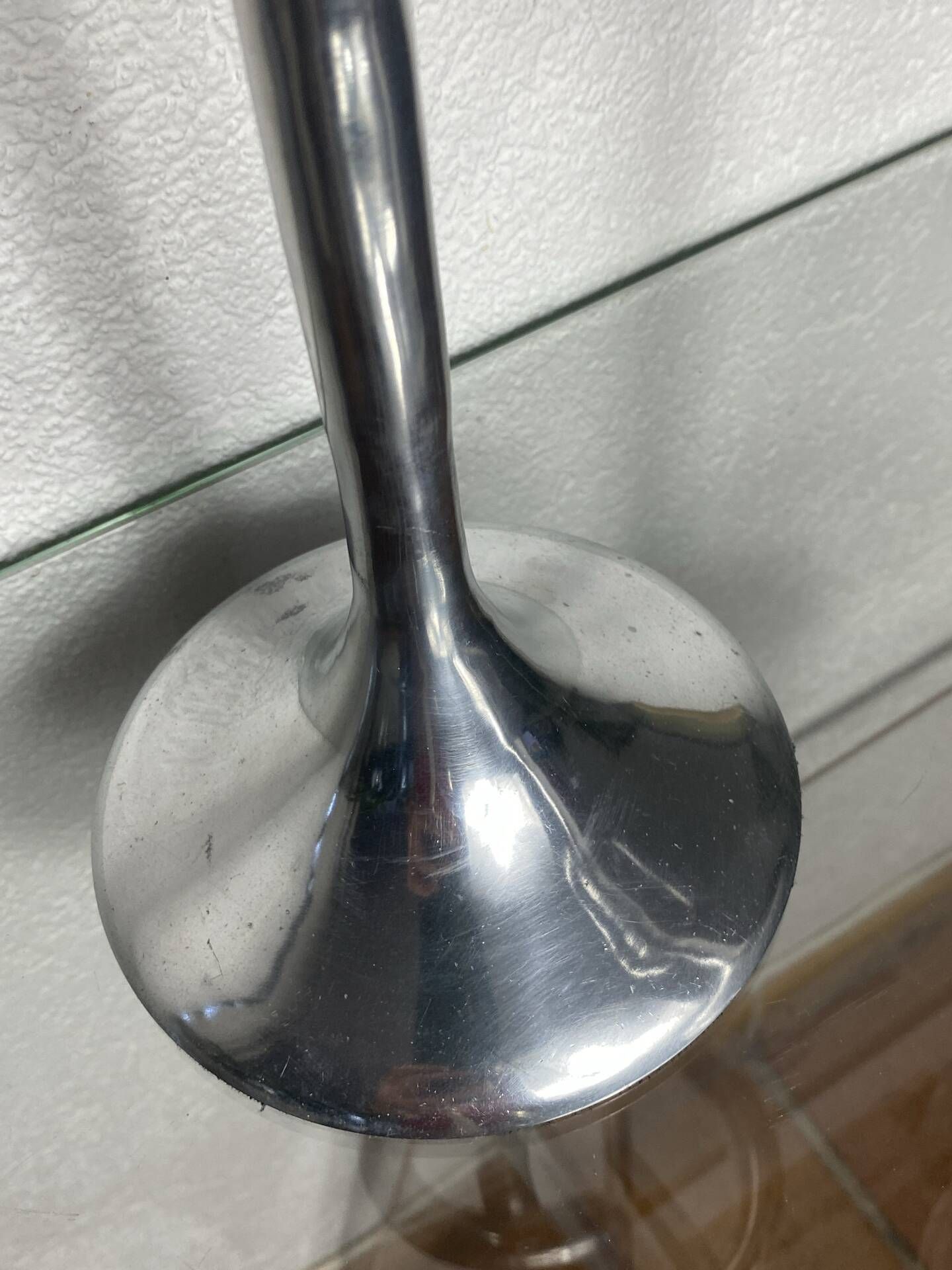 Pair of large aluminium bow candlesticks, Italy, 1970.