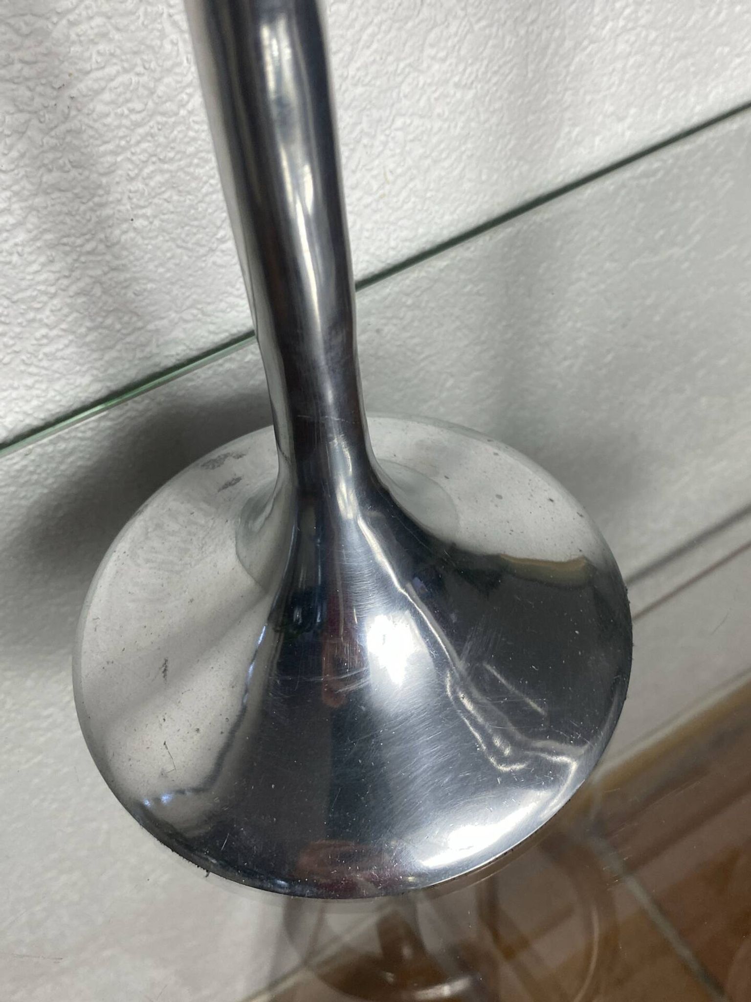 Pair of large aluminium bow candlesticks, Italy, 1970.