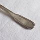 Cockerel + silver metal spoon