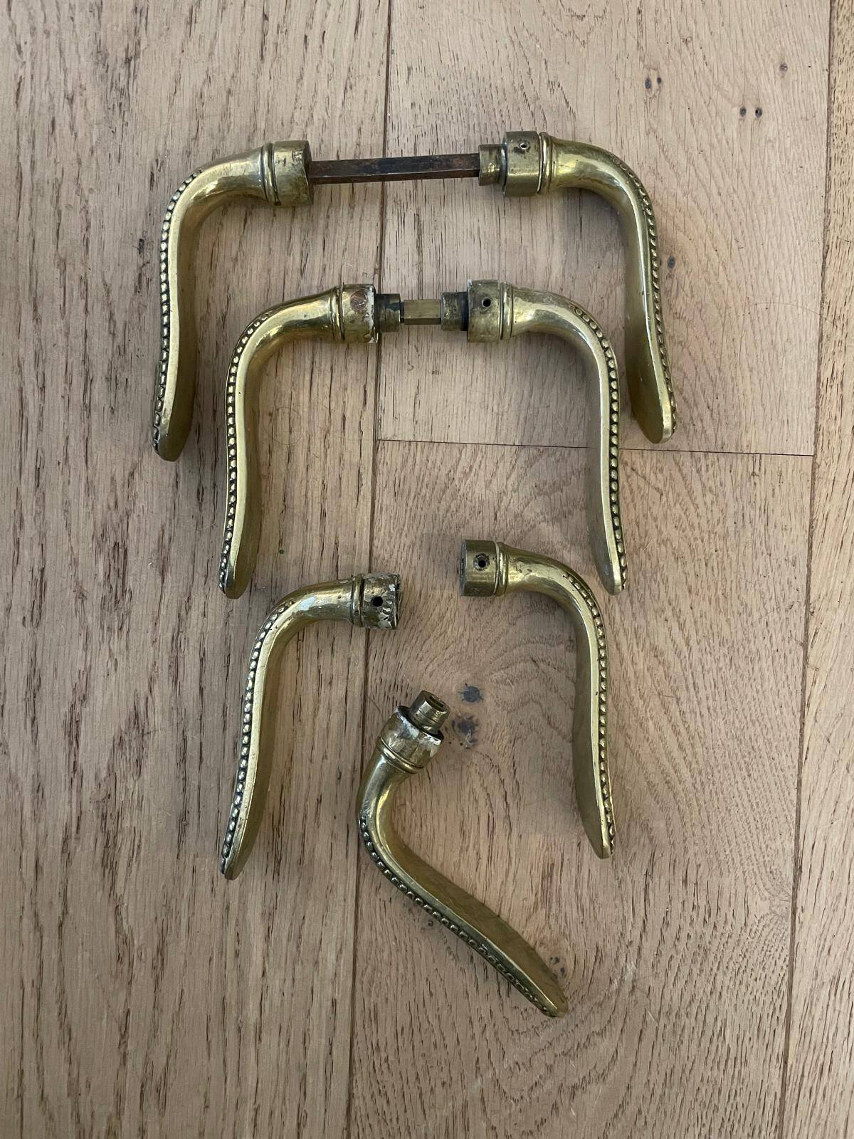 Set of 7 solid brass door handles
