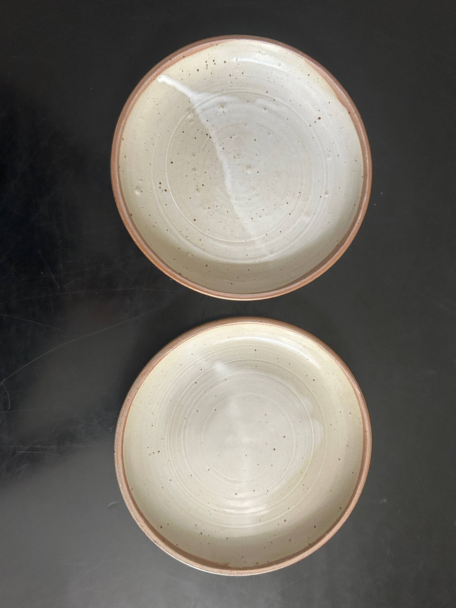 7 stoneware plates 1970