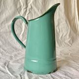 Vintage pitcher in green enameled sheet metal