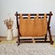 Foldable magazine rack in wood and jute fabric - brutalist
