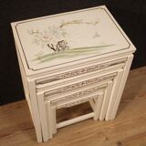 Four lacquered and painted living room coffee tables