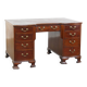 Antique English wooden desk from the late 19th century with a leather top