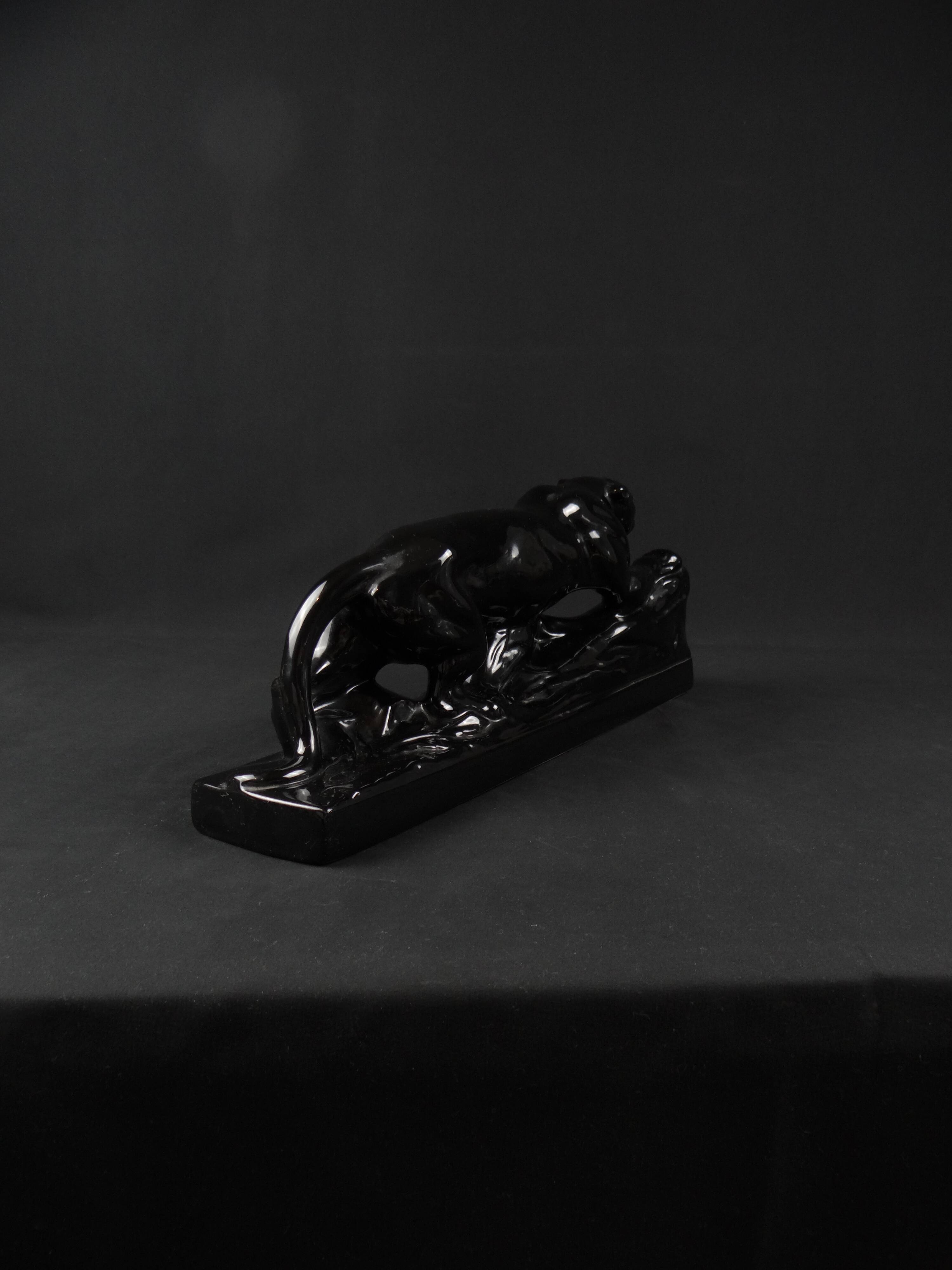 Black ceramic hunting panther from the Art Deco period, circa 1930