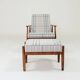 Vintage armchair and beige blue tartan footrest modern design
