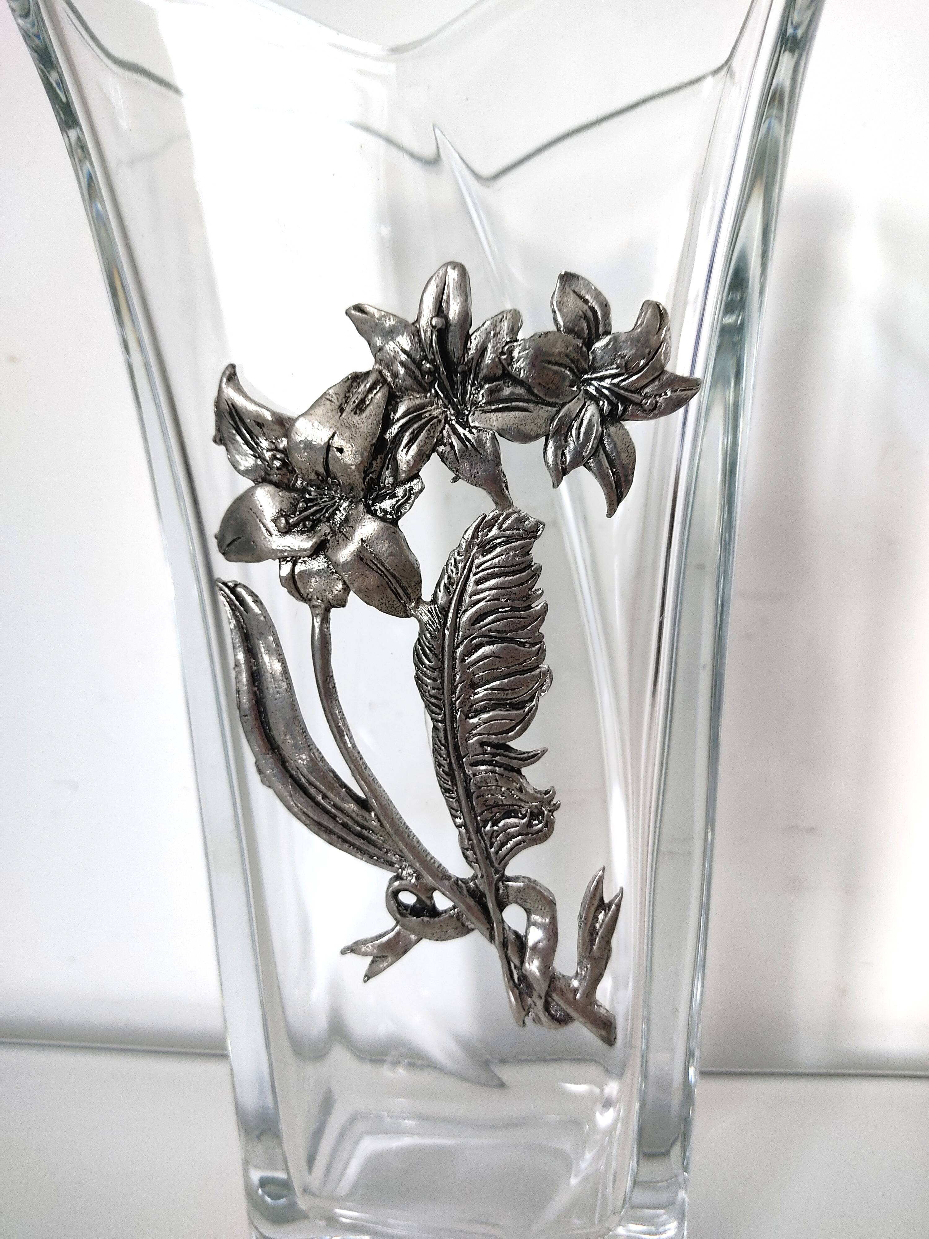 Glass vase with metal flower application