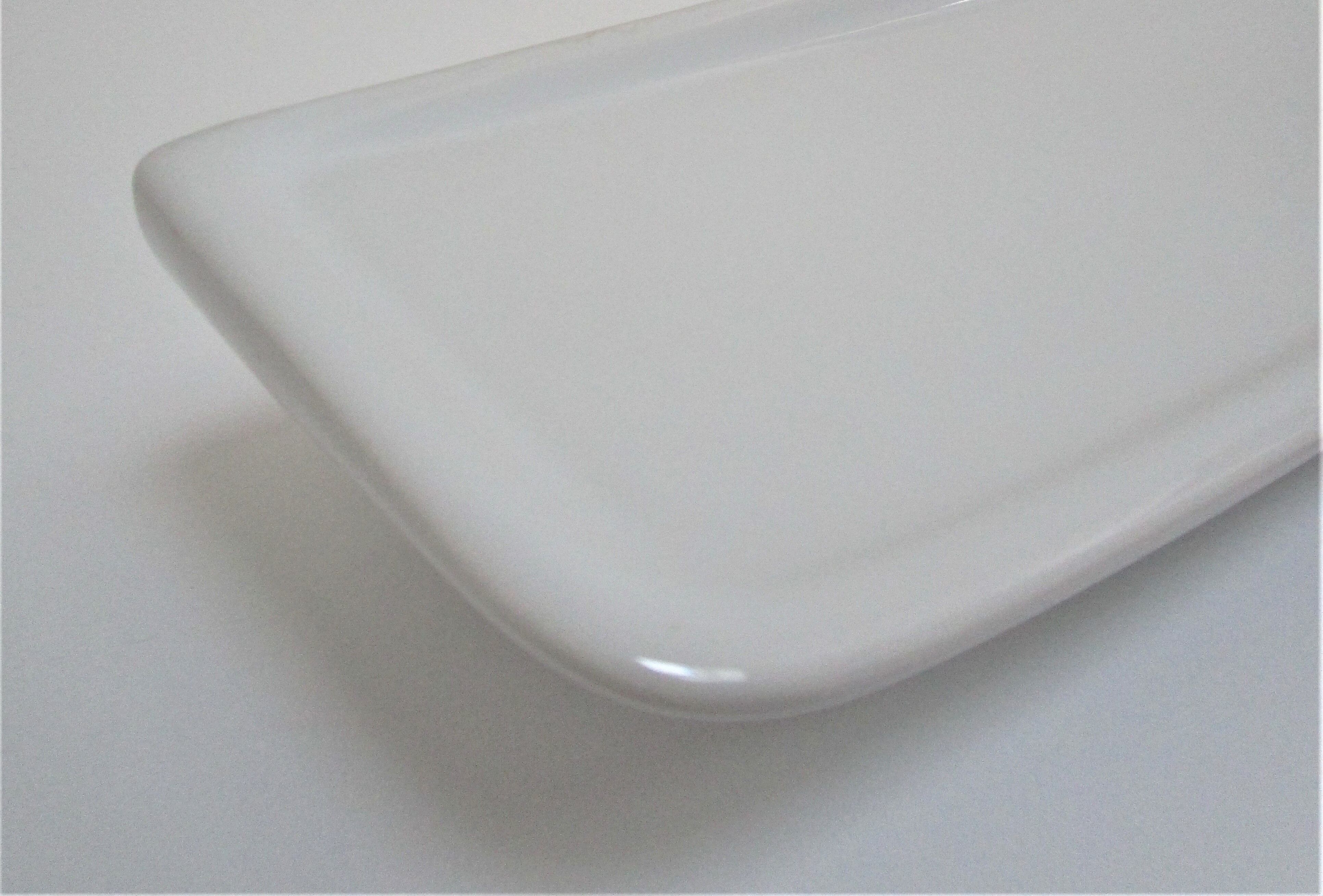 Vintage white enamelled ceramic wall shelf