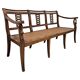Directoire canapé in walnut with brass inlays, late 18th century.