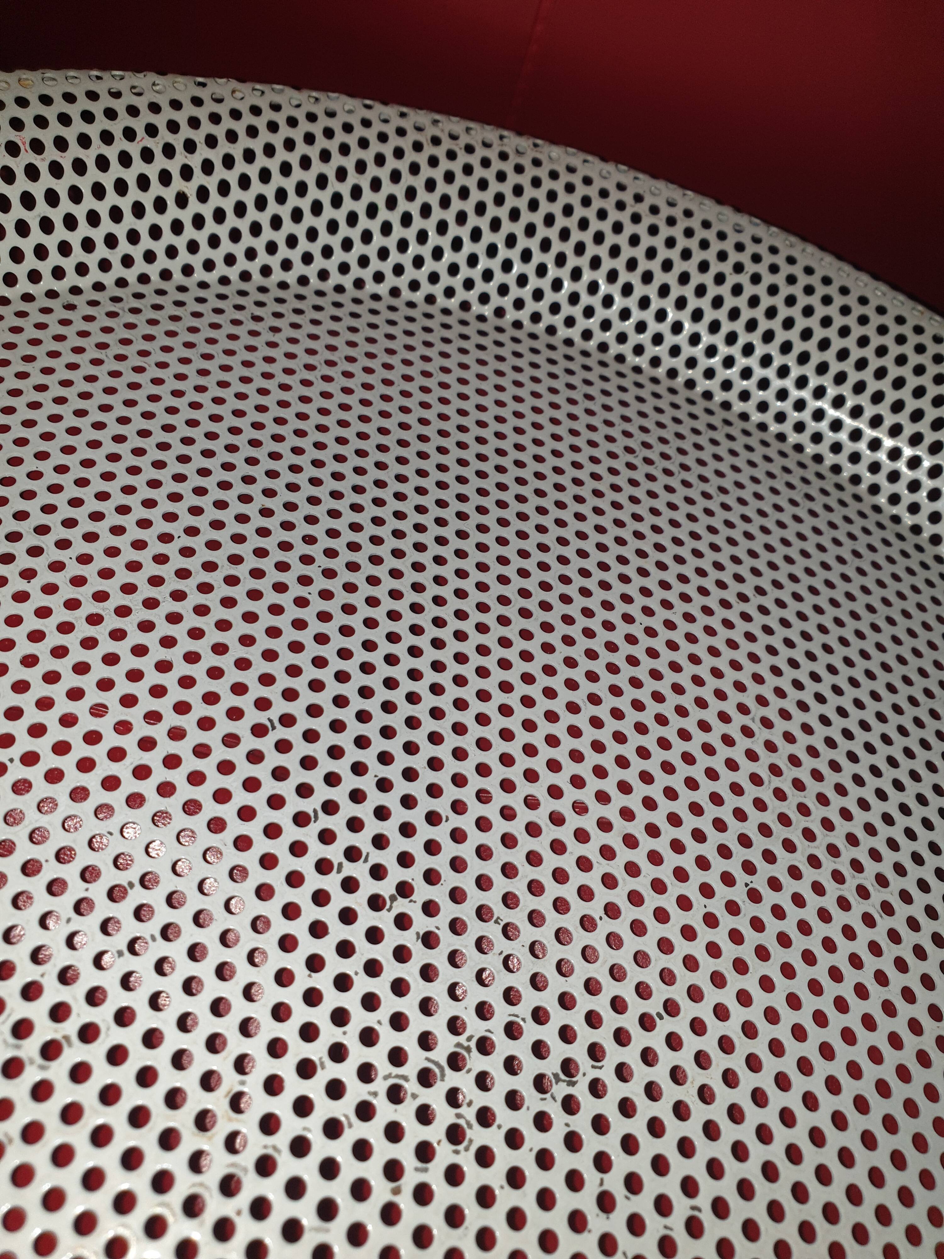 Perforated sheet metal tray by Mathieu Mategot