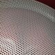 Perforated sheet metal tray by Mathieu Mategot