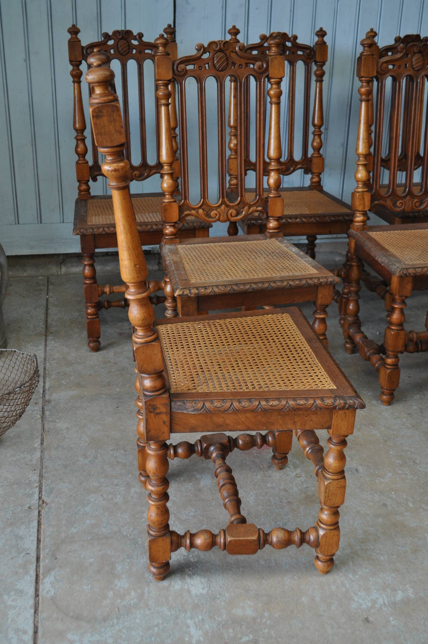 Set of 8 tanned chairs.