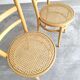 Paire chaises Baumann bois clair et cannage