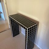 Console tile black mosaic and white joint