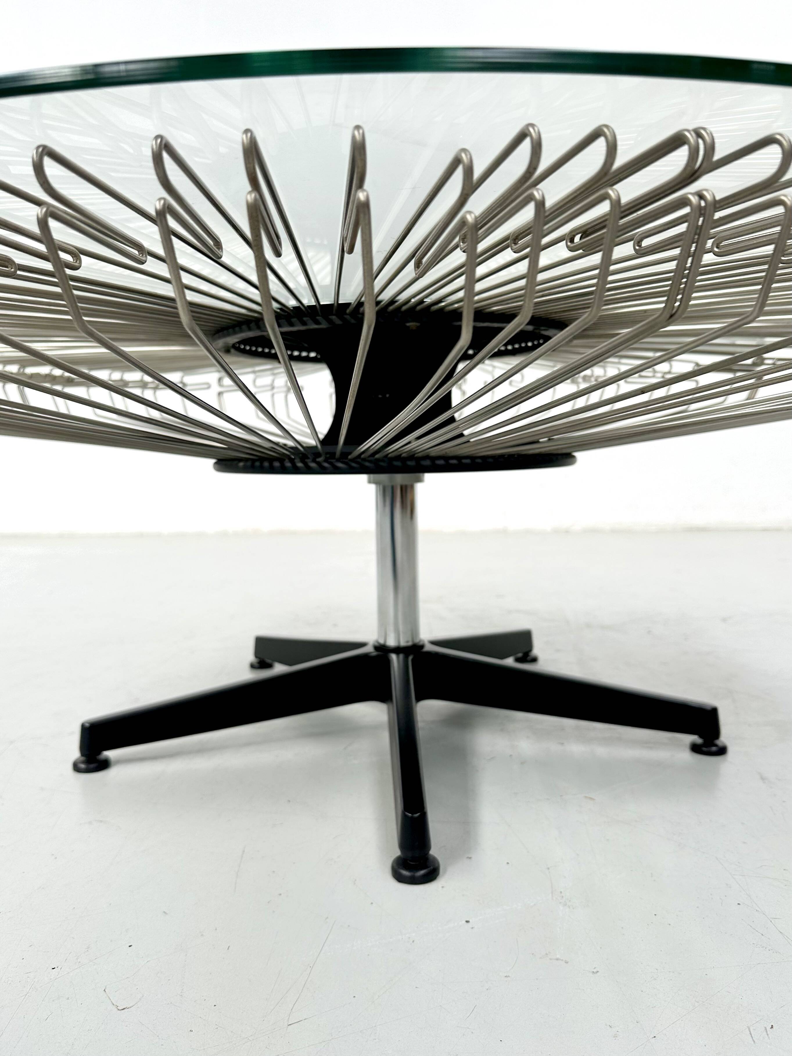 Italian rotating glass and metal coffee table designed for Prada, 1990s.