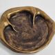 Bronze pocket emptier by Denis Mathews (1913-1997), "Rhinoceros Footprint" (12 cm), 1995
