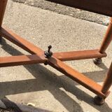 Antique black wooden console, central drawer and turned legs, 19th-century style.