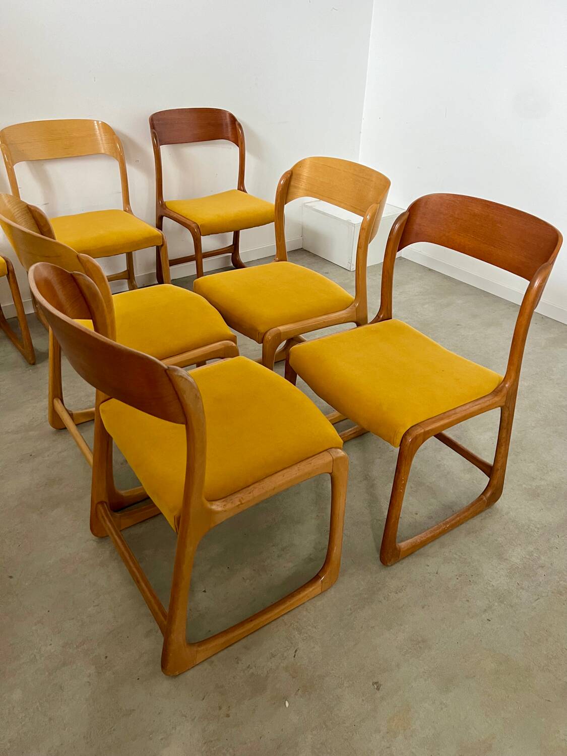Set of 7 Baumann sled chairs in wood and mustard yellow fabric, 1960s
