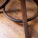 Baumann swivel parrot coat rack, dark wood.