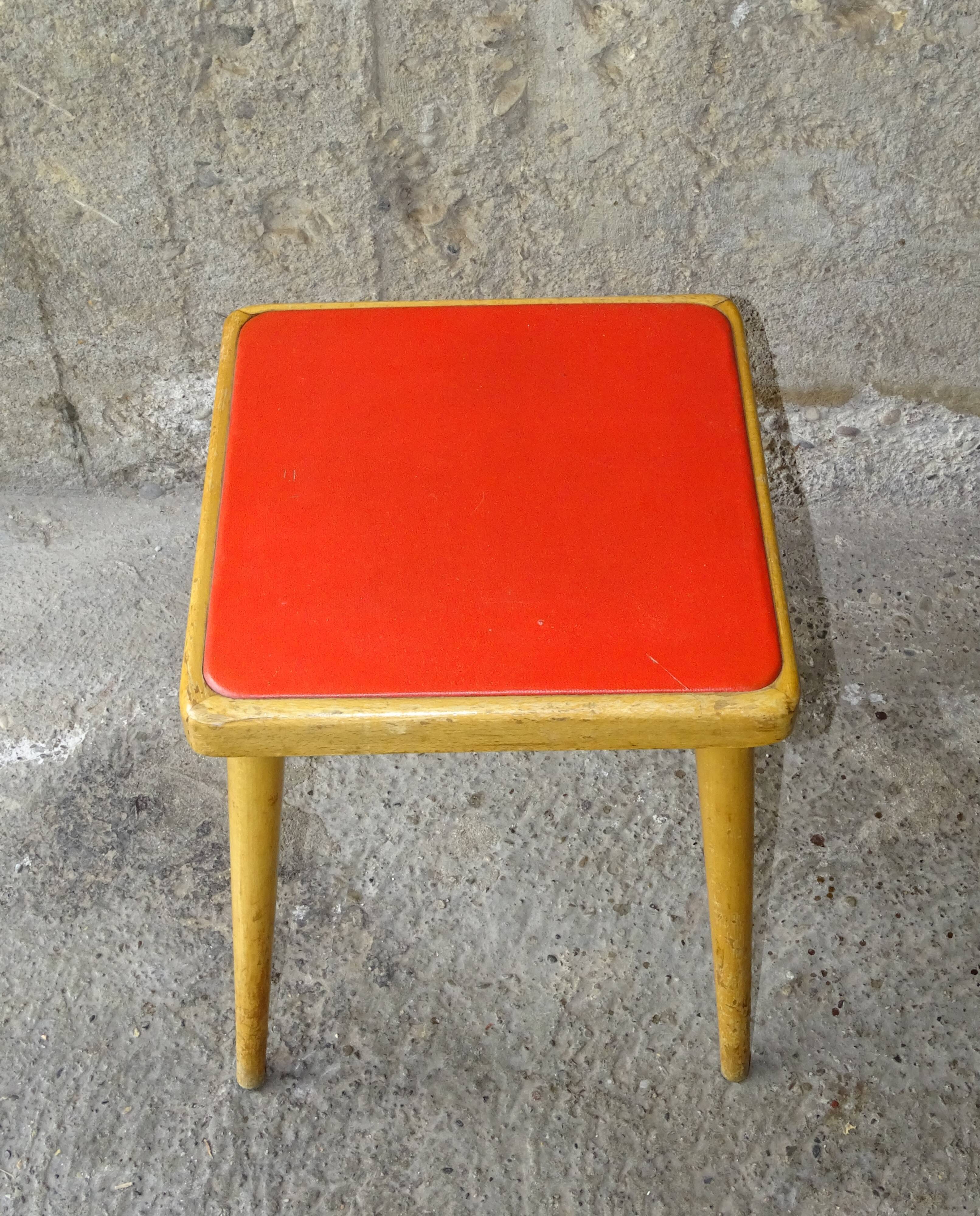 Square Baumann stool from 1970 in red skai